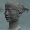 image: A work of a female head made of various materials:4